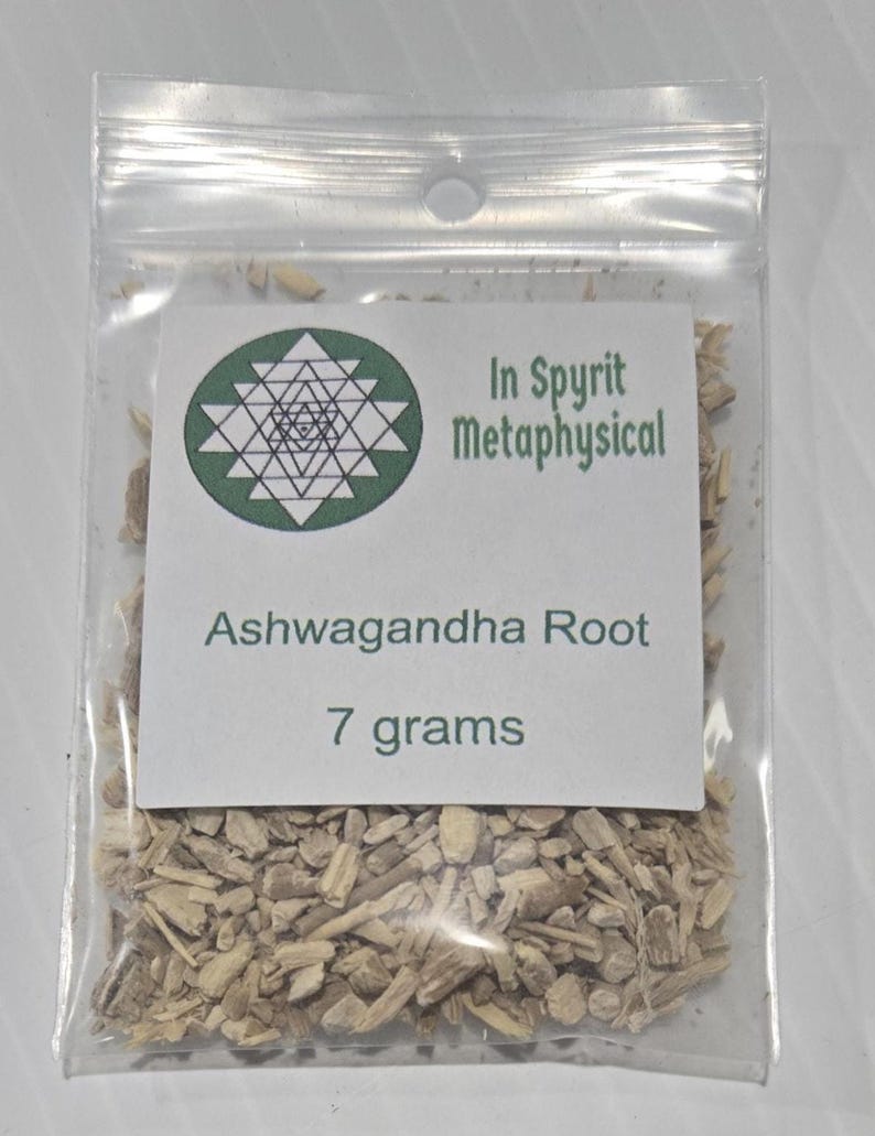 A single clear bag of Ashwagandha Root from In Spryit Metaphysical, labeled as 7 grams, showing the natural shredded root texture and the company's circular green logo