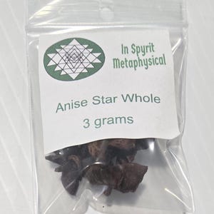 A close-up of a 3-gram clear resealable bag of Whole Star Anise pods. The white InSpyrit Metaphysical label is centered, showcasing the high-quality, star-shaped brown botanicals used for luck and spiritual clarity.