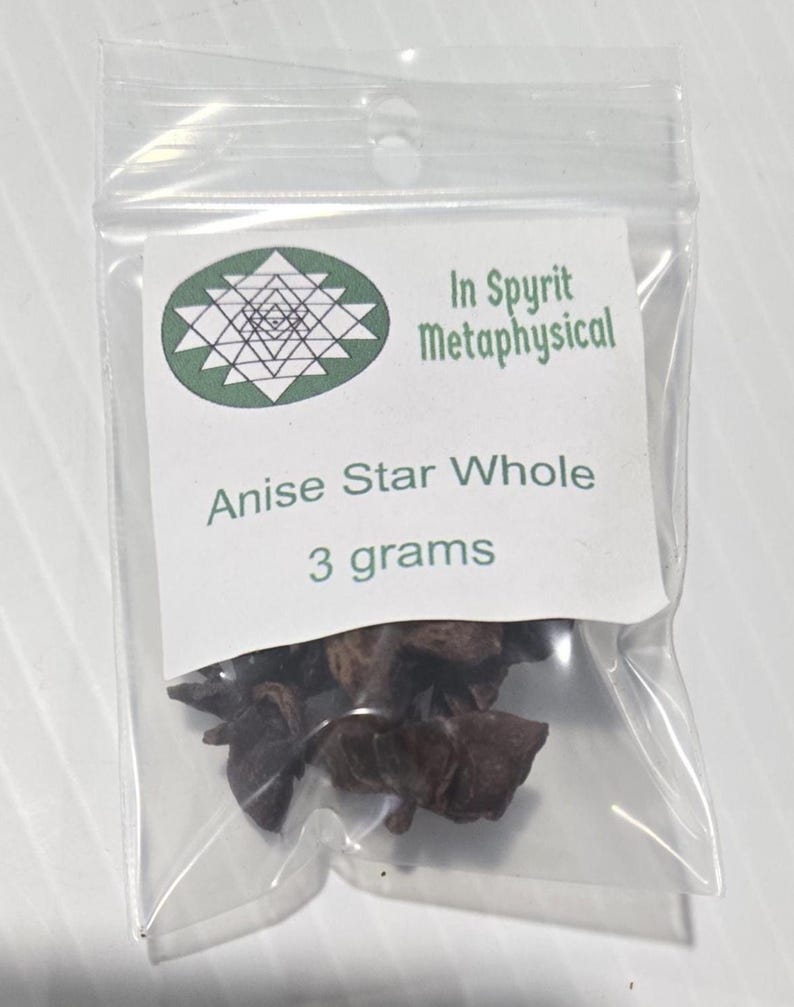 A close-up of a 3-gram clear resealable bag of Whole Star Anise pods. The white InSpyrit Metaphysical label is centered, showcasing the high-quality, star-shaped brown botanicals used for luck and spiritual clarity.