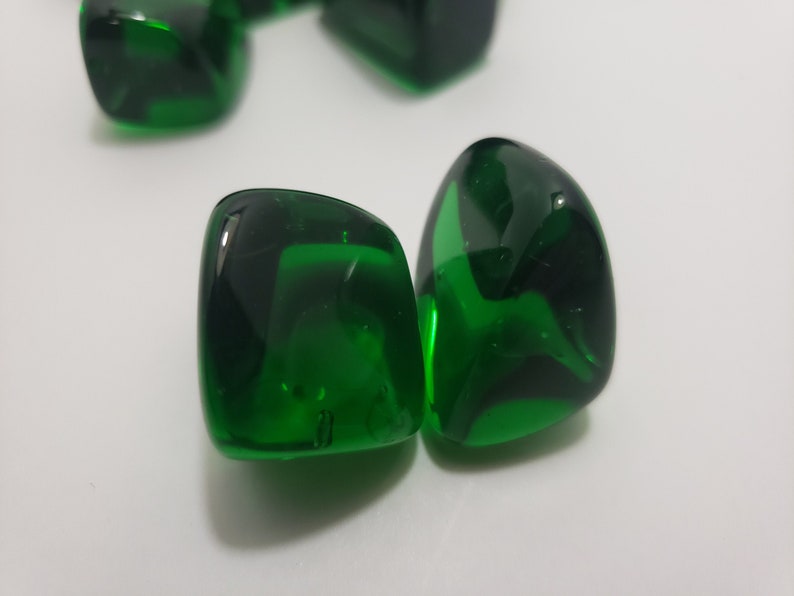 Green Obsidian helps to overcome feelings of stagnation. Acts as a shield, psychic stone with many metaphysical properties. Mayan stone. image 2