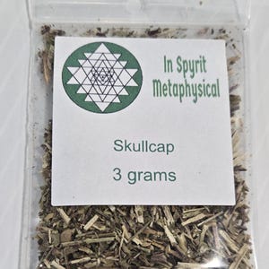 A single clear plastic ritual bag containing dried organic Skullcap Leaf from In Spyrit Metaphysical, featuring the shop's logo and clearly labeled as 3 grams.