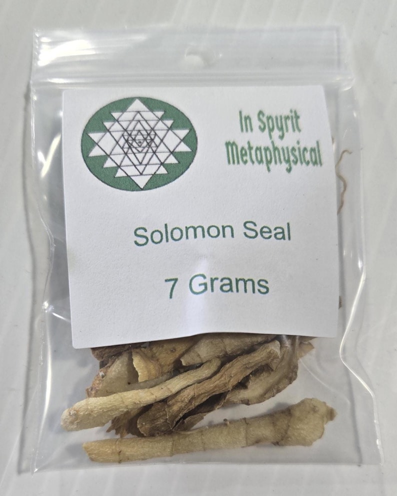 A close-up, vertical shot of a single 7-gram bag of Solomon's Seal Root from InSpyrit Metaphysical held against a white background. The clear packaging shows the dried, chopped root pieces, and the white label clearly displays the shop's green sacred geometry logo, "Solomon Seal" name, and the "7 Grams" weight.
