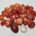Carnelian,Known as the singer's stone, the Carnelian crystal is a warm,Stone Crystal shop,Metaphysical shop,Wicca shop,Witch supply,New Age