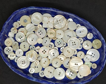 Old mother of pearl buttons. Great tattered lot for your crafting project. Collage. Mixed media. Decor