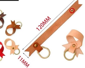 May include: Leather craft supplies, including a brown paper pattern with text, and several leather keychains in various colors: blue, brown, black, red, and tan. The leather strap is 120mm long and 11mm wide.