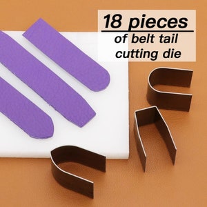 May include: Image of 18 pieces of belt tail cutting die. The image shows three purple leather belt tails and three metal cutting dies. The text "18 pieces of belt tail cutting die" is in the upper right corner.