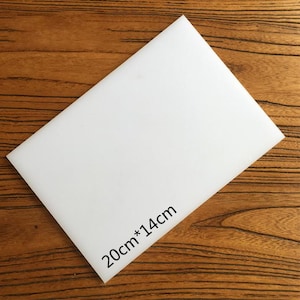 White cushion plate.Stamping plate.Handmade DIY leather plastic pad.Knock the diamond,chop the hole,punch and smash the buckle pad. 20*14cm