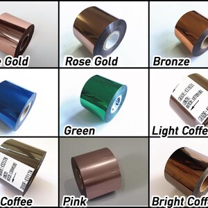 May include: Nine rolls of metallic ribbon in shades like Apple Gold, Rose Gold, Bronze, Bule, Green, Light Coffee, Deep Coffee, Pink, and Bright Coffee. Each roll is labelled with its colour name.