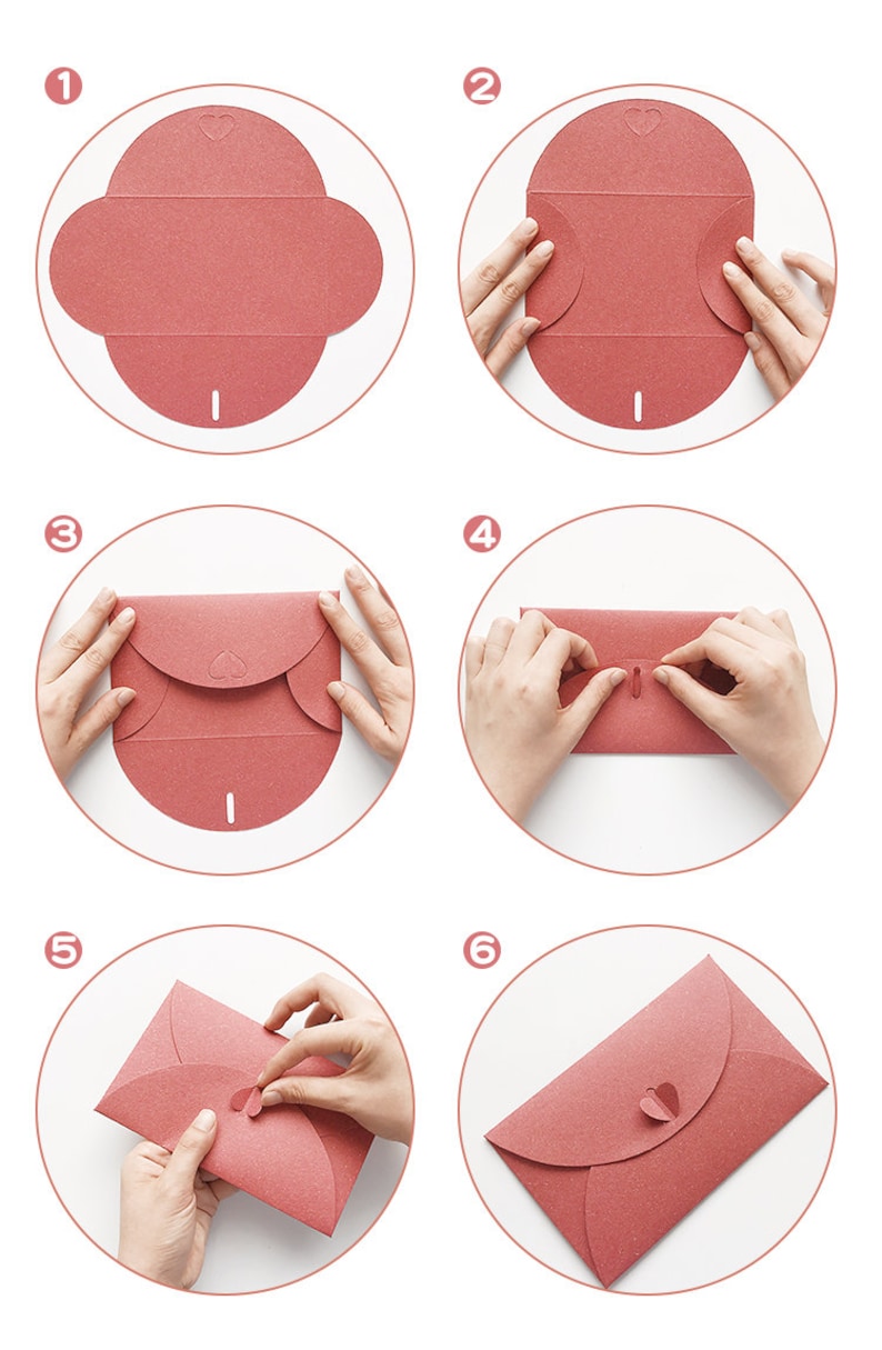 May include: Step-by-step instructions for assembling a red paper envelope. The process is shown in six stages, with hands folding the paper. The envelope features a heart-shaped closure.