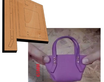 May include: A small, purple handbag with two handles, measuring 114mm wide and 65mm high. The bag has silver-colored rivets. A wooden template for the bag is also shown.