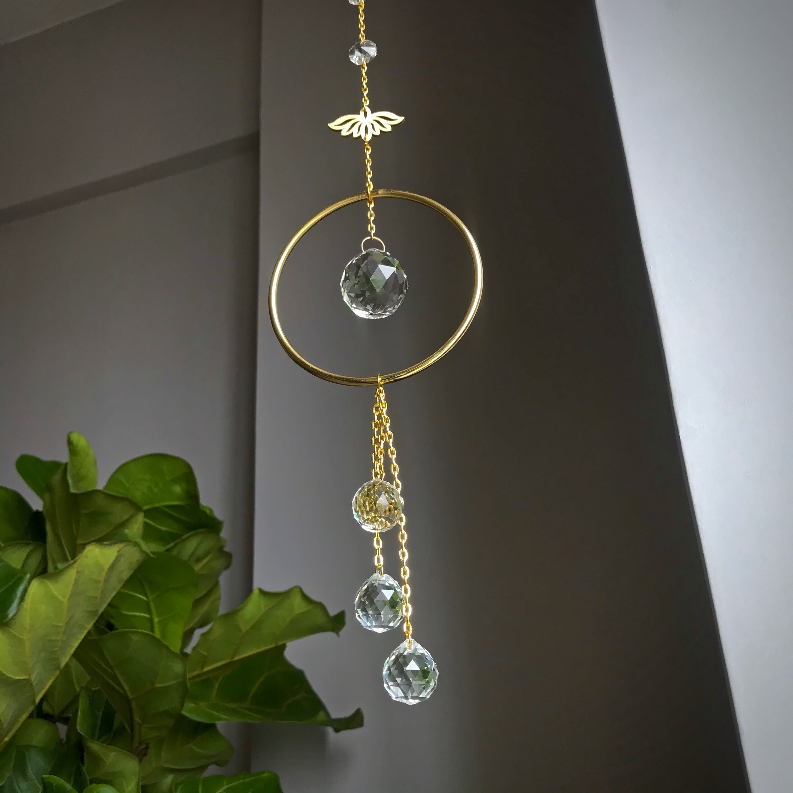 Surya Cascade Floral Engraved Brass Suncatcher main image 1