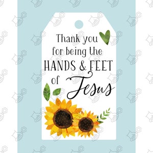 May include: White tag with a green heart and sunflowers. The tag says "Thank you for being the HANDS & FEET of Jesus".
