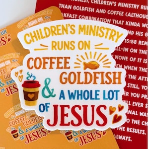 May include: A white sticker with the text "Children's Ministry Runs On Coffee & Goldfish & A Whole Lot of Jesus." The sticker features a coffee cup, a goldfish, and heart accents. Additional stickers are visible in the background.