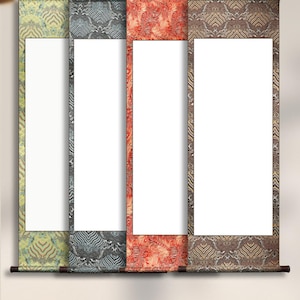 May include: Four decorative wall scrolls with ornate patterned borders in shades of green, gray, red, and brown. Each scroll has a large white rectangular space for artwork or text, and a dark brown wooden dowel at the bottom.