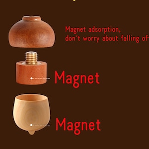 May include: A wooden acorn-shaped bottle stopper with a magnetic top. The stopper is made of two pieces, the top and bottom, which are held together by a magnet. The text "Magnet adsorption, don't worry about falling off" is written in red on a brown background.