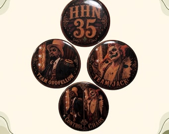 May include: Four circular pin-back buttons featuring dark, theatrical imagery. One button displays 'HHN 35'. Another shows a ringmaster figure labeled 'TEAM ODFELLOW'. A third depicts a clown labeled 'TEAM JACK'. The fourth shows both, labeled 'CONTROL CHAOS'.