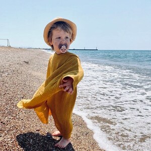 100％オーガニックのエコテックスとゴッツ認定のモスリン製キッズポンチョ、キッズバッチ、ビーチタオル。 Ein musselin baumwolle ポンチョハンドタッチ フュア キンダー