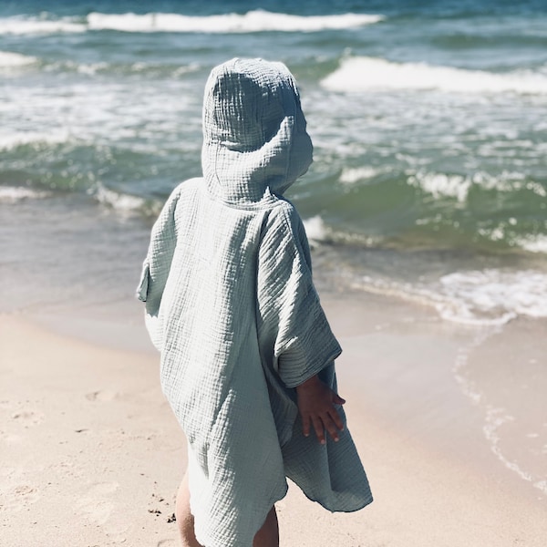 100% organic Oeko-Tex and Gots certificated muslin kids poncho, Kids batch, beach towel. Ein musselin baumwolle Poncho-Handtuch für Kinder