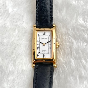 Vintage Seiko Spirit Gold Watch: Roman Numeral Dial, Square Tank Shape
