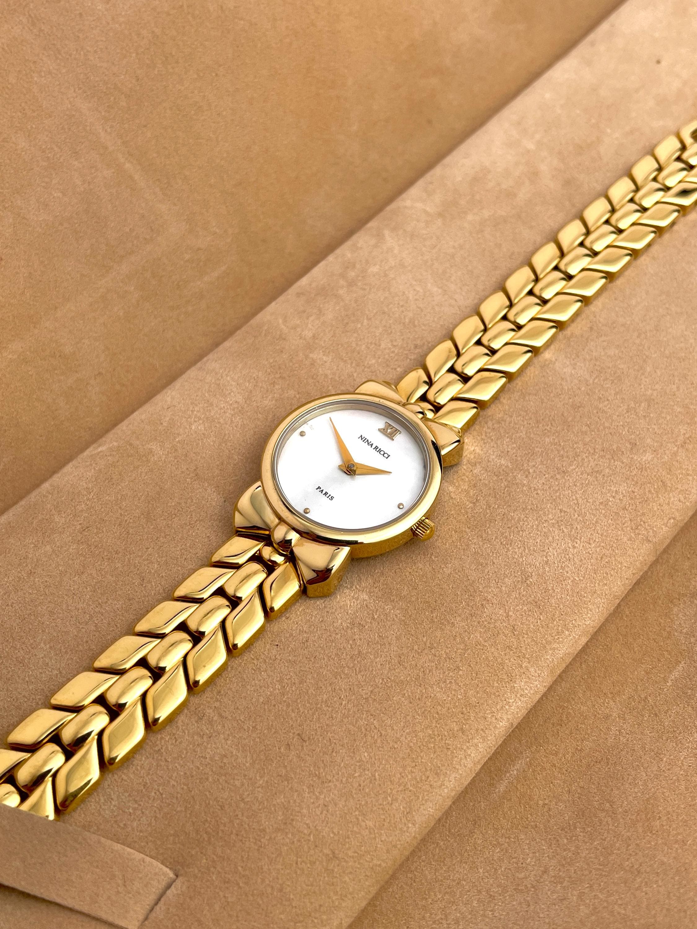 時計 Nina Ricci Dia Ruby watch Rank B Nina Ricci Dia Ruby watch Rank B VINTAGE NINA RICCI MOTHER-OF