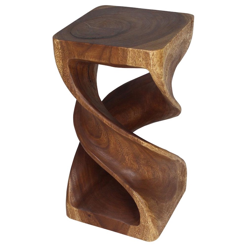 May include: A dark brown wooden stool with a unique twisted design. The stool has a square top and a wide base.
