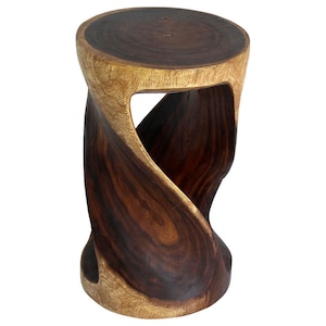 May include: A wooden stool with a twisted design. The stool is made of dark brown wood with a light brown finish. The top of the stool is round and has a natural wood grain.
