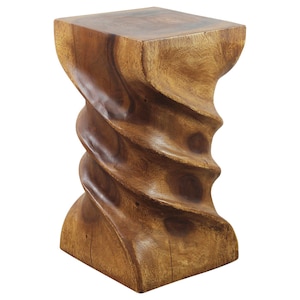 May include: A wooden stool with a unique spiral design. The stool is made of solid wood and has a natural brown finish.