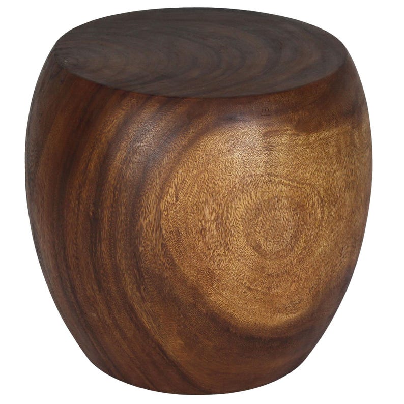 May include: A solid, wooden stool with a rounded shape. The stool is made of dark brown wood with visible grain patterns. The top is flat, and the sides curve inward towards the base. A simple, natural design.