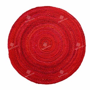 May include: Red round jute rug with a circular pattern. The rug is made of natural fibers and has a rustic look.