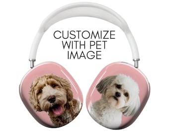 May include: A pair of pink wireless headphones with a white headband. The earcups feature images of two dogs, one a brown and white doodle and the other a white and gray shih tzu. The text "CUSTOMIZE WITH PET IMAGE" is printed on the headband.