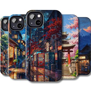 May include: Four different phone cases with Japanese-inspired designs. The cases feature a variety of scenes, including a city street, a cherry blossom tree, and a mountain. The cases are all black and have a glossy finish.