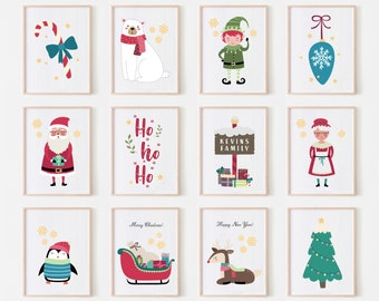 May include: A set of twelve framed Christmas-themed wall art prints featuring illustrations of a candy cane, polar bear, elf, ornament, Santa Claus, the text Ho Ho Ho, a sign reading KEVINS FAMILY, Mrs. Claus, a penguin, a sleigh, a reindeer, and a tree.