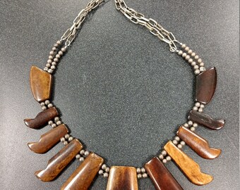 African; bone; horn; brown; pewter; chain; bib;