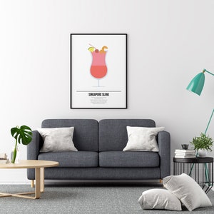 K&ouml;nnte beinhalten: Ein minimalistisches Poster mit schwarzem Rahmen, das eine farbenfrohe Illustration eines Singapore Sling Cocktails zeigt. Der Text "SINGAPORE SLING" ist unter der Illustration gedruckt.