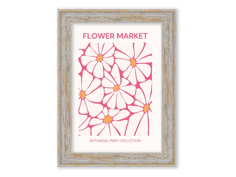 May include: A framed print with a pink and white floral design. The print features a repeating pattern of stylized white daisies with orange centers on a pink background. The text "FLOWER MARKET" and "BOTANICAL PRINT COLLECTION" is printed below the floral design.