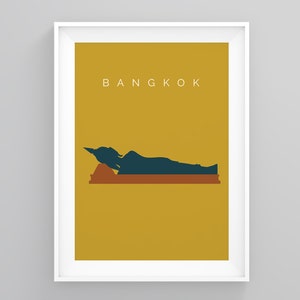 May include: A yellow poster with the word "BANGKOK" in white text at the top. A dark blue silhouette of a reclining Buddha is in the centre of the poster.