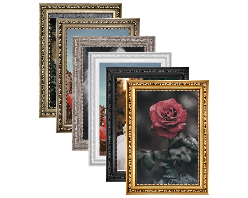May include: A set of five picture frames in various sizes and colors, including gold, silver, white, black, and a dark wood tone. The frames are all ornate with intricate details and have a vintage aesthetic. The frames are arranged in a staggered pattern, with the largest frame at the bottom and the smallest frame at the top.