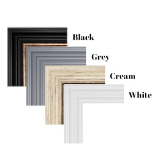 May include: Four picture frame corners in different colors: black, grey, cream, and white. The frames are stacked on top of each other, with the black frame at the top and the white frame at the bottom.