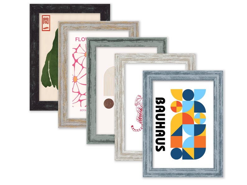 May include: Five different picture frames with various designs and colors. The frames are made of wood and have a distressed finish. The frames are arranged in a stack, with the largest frame at the bottom and the smallest frame at the top. The frames are all empty, but they are ready to be filled with your favorite photos or artwork.
