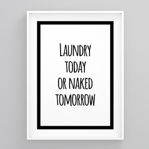 May include: A white framed print with black text that reads "Laundry Today Or Naked Tomorrow".