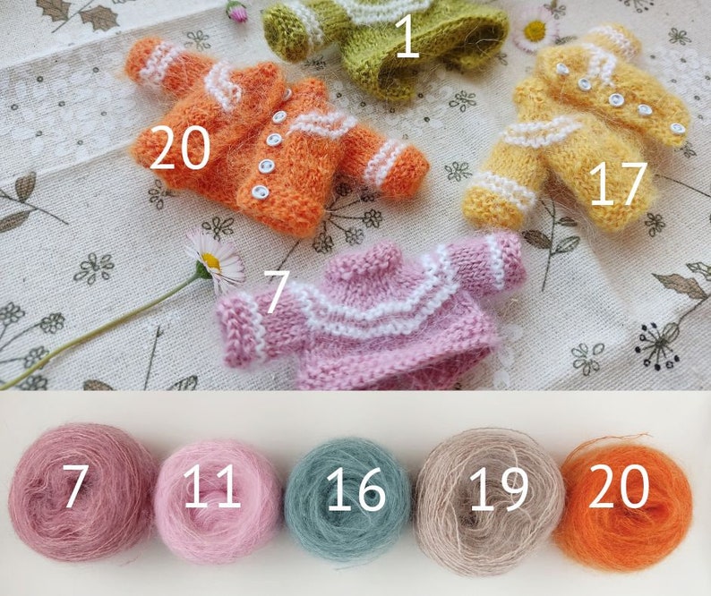 May include: Ten balls of yarn in various colors, including pink, orange, beige, and green. The yarn is labeled with numbers 7, 11, 16, 19, and 20.