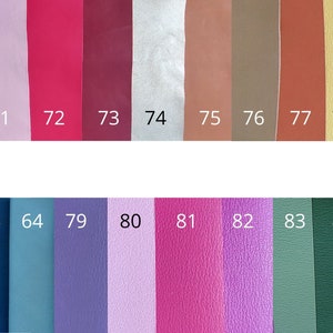 May include: A color chart with 12 different leather swatches. The swatches are numbered 63, 64, 71, 72, 73, 74, 75, 76, 77, 78, 79, 80, 81, 82, 83, and 84.