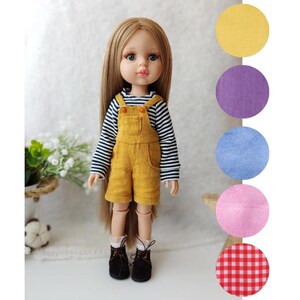 May include: A doll wearing a yellow overall dress with a striped shirt underneath. The doll has long brown hair and blue eyes. The image also shows a variety of fabric swatches in different colors and patterns.
