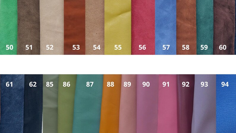 May include: A swatch card with 14 different colored leather samples. The samples are numbered 50 through 60 and 85 through 94.