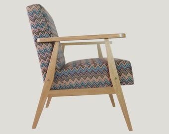 Modern armchair with the soul of armchairs vintage. Hand made in a craft workshop, inspired by the mid century modern style.