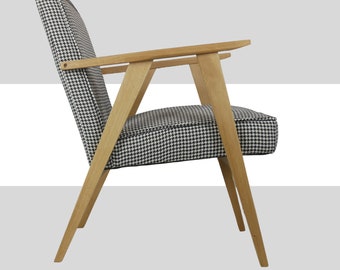 New oak armchair in houndstooth fabric inspired by mid-century style -. A stylish café armchair with wooden armrests.