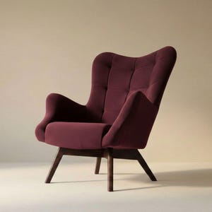 May include: A deep burgundy upholstered armchair featuring a high, tufted backrest with a grid pattern, curved armrests, and a solid dark wood base with four angled legs. The chair has a structured silhouette and a smooth, matte fabric finish.
