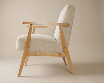 Modern oak armchair with Bouclé upholstery - cosy elegance with timeless craftsmanship