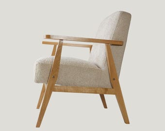 Modern oak armchair with Bouclé upholstery - cosy elegance with timeless craftsmanship