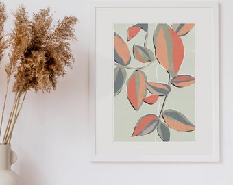May include: A white framed print with a stylized illustration of a branch of leaves in shades of green, orange, and red against a light green background.